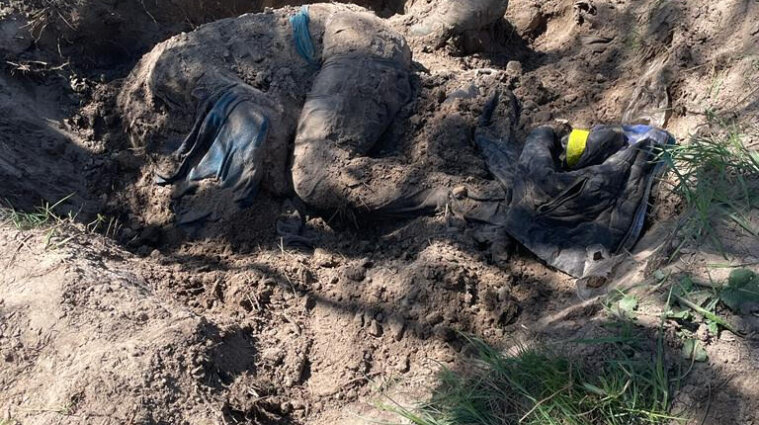 Застрелили и закопали: нашли еще троих убитых рашистами жителей Киевщины - фото