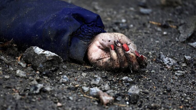 На звільненій Київщині знайшли сотні тіл мирних жителів: закатовані та лежать посеред дороги (фото)
